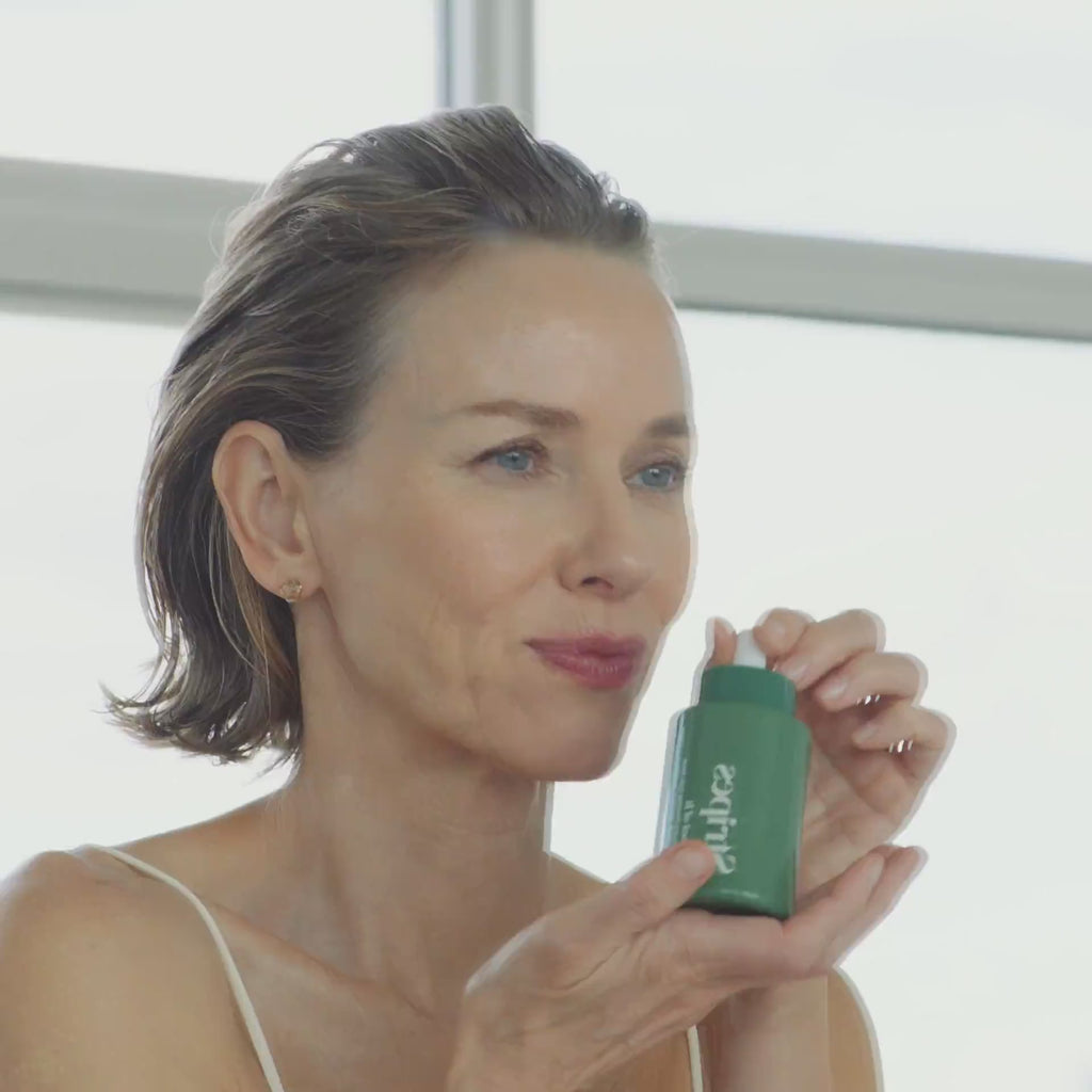 Naomi Watts showcasing the Root of It product in her bathroom